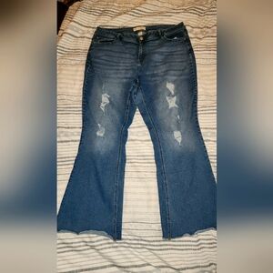Distressed flare leg jeans